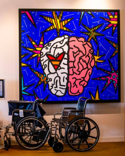 Wheelchairs are parked beside brain-related art at the Cleveland Clinic Lou Ruvo Center for Bra ...