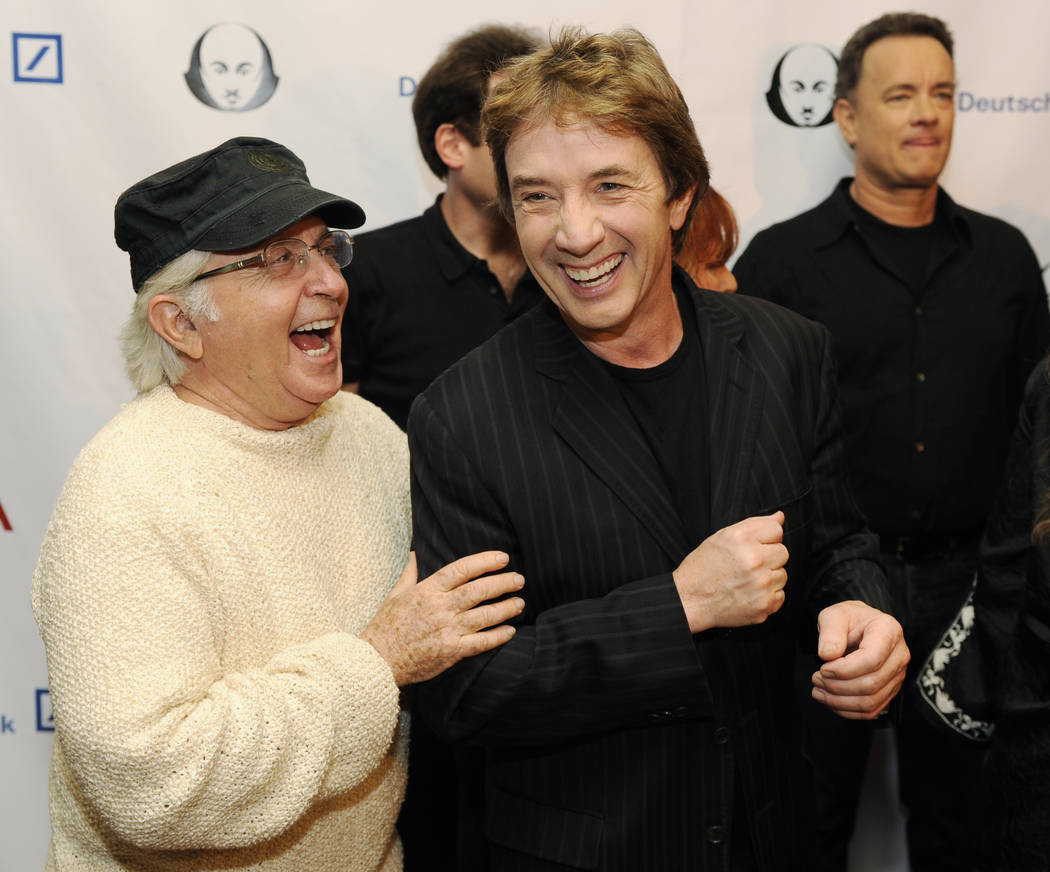 Cast members Arte Johnson, left, and Martin Short, center, share a laugh as fellow cast member ...