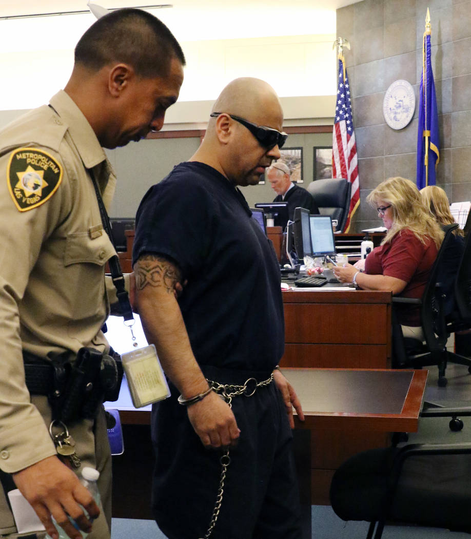 Gustavo Ramos-Martinez is led out of the courthouse at the Regional Justice Center after judge ...