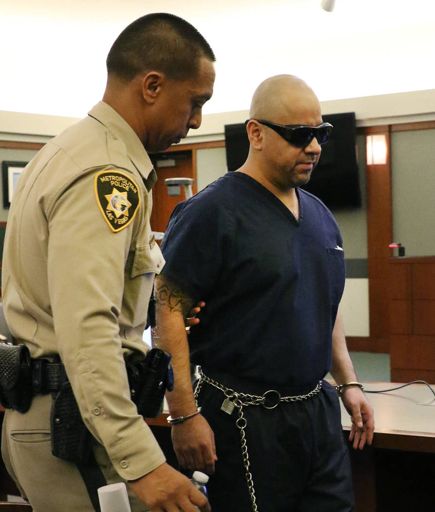 Gustavo Ramos-Martinez is led out of the courthouse at the Regional Justice Center after judge ...