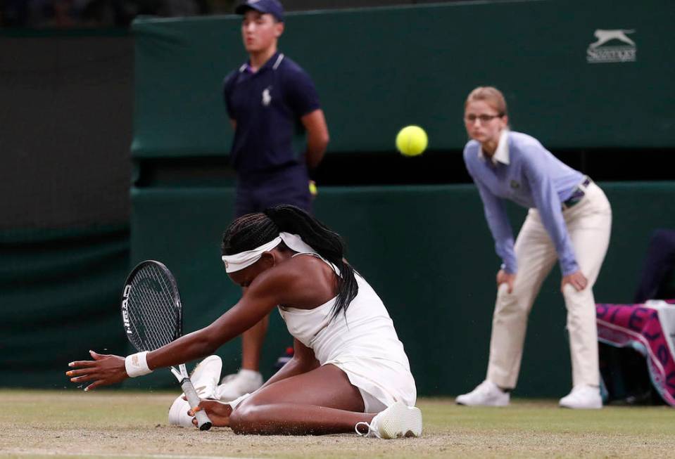 United States' Cori "Coco" Gauff slips after returning to Slovakia's Magdalena Rybaik ...