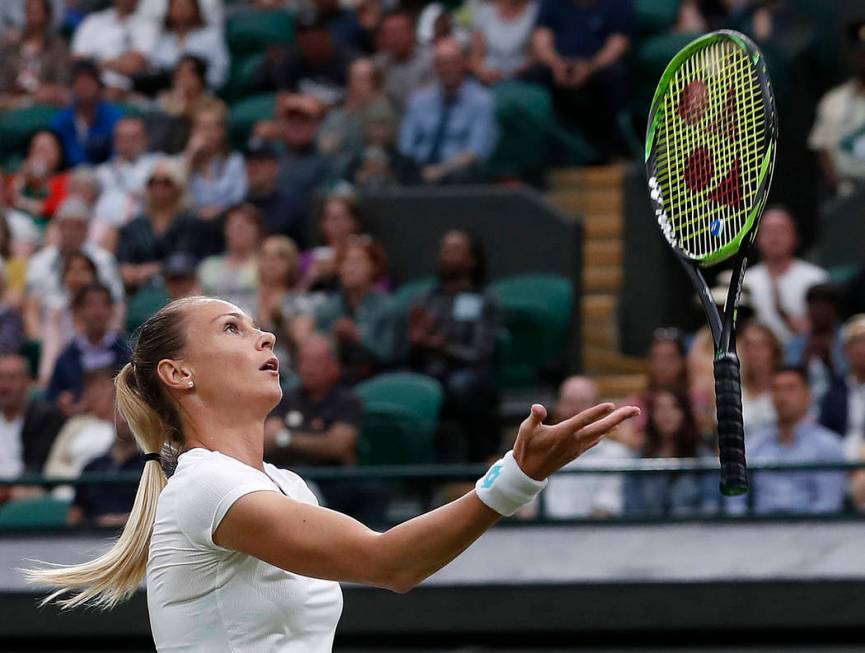 Slovakia's Magdalena Rybaikova tosses her racquet into the air after a shot to United States' C ...