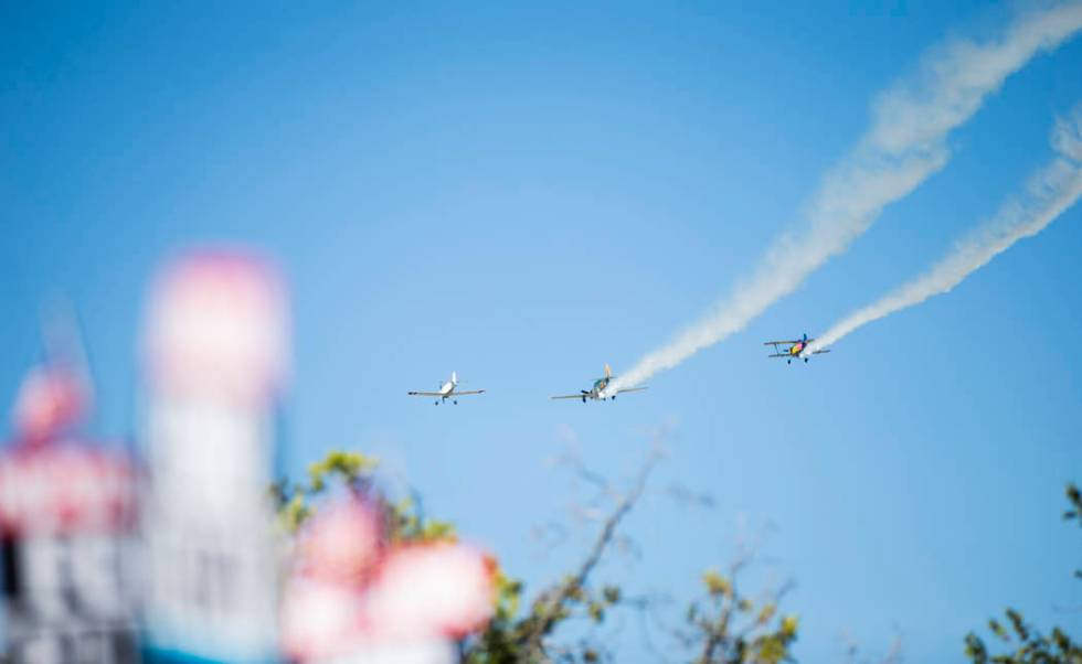 Planes manned by members of the Boulder City Veteran's Flying Group fly overhead during the par ...