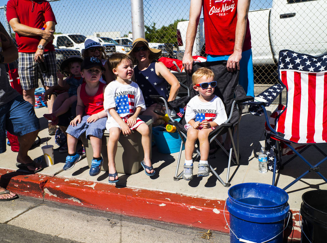 Spectators watch parade participants pass by at the annual Damboree Celebration in Boulder City ...