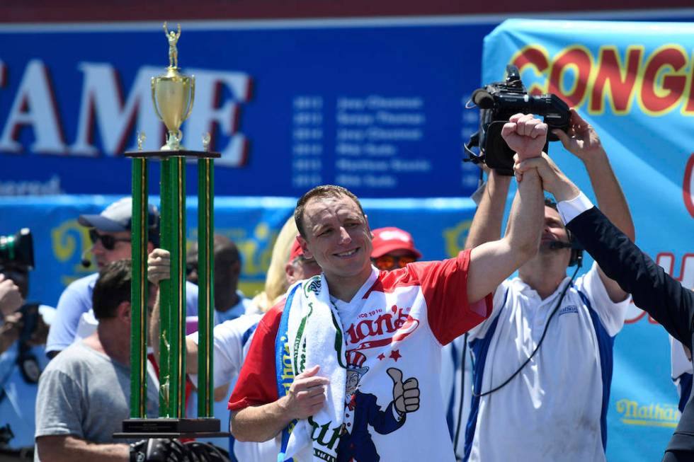 Joey Chestnut reacts after winning the men's competition of Nathan's Famous July Fourth hot dog ...