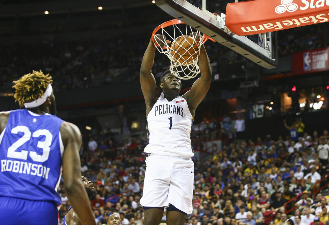 New Orleans Pelicans' Zion Williamson (1) dunks against the New York Knicks during the first ha ...