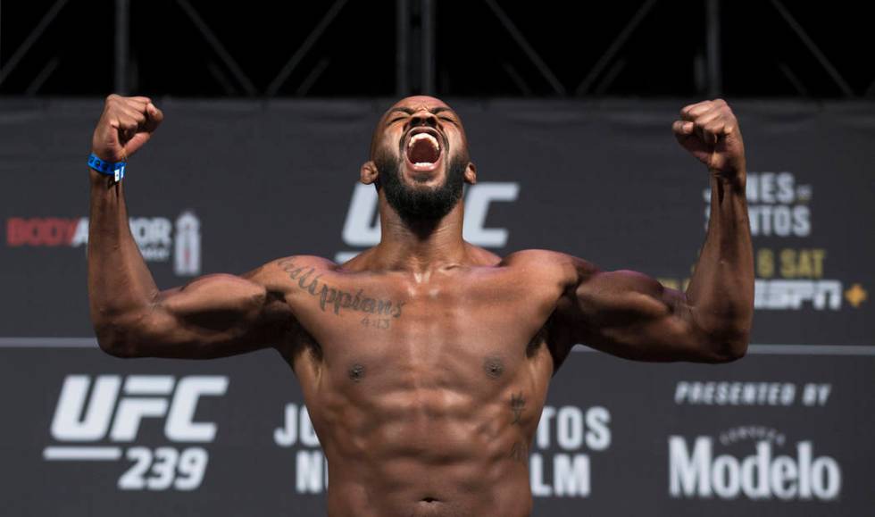 UFC light heavyweight champion Jon Jones screams into the crowd while weighing in for UFC 239 o ...