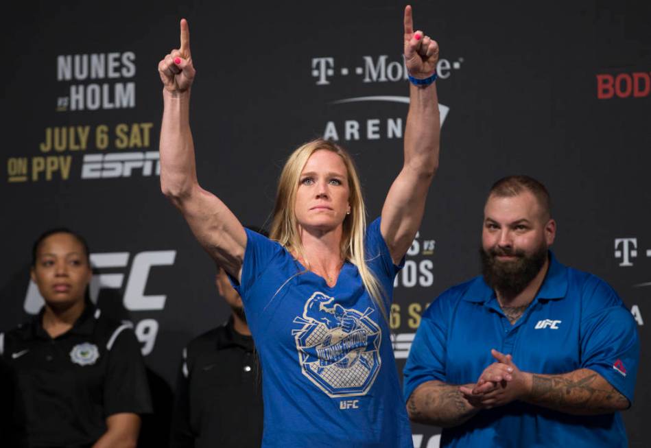 UFC bantamweight Holly Holm points to the crowd during weigh ins for UFC 239 on Friday, July 5, ...