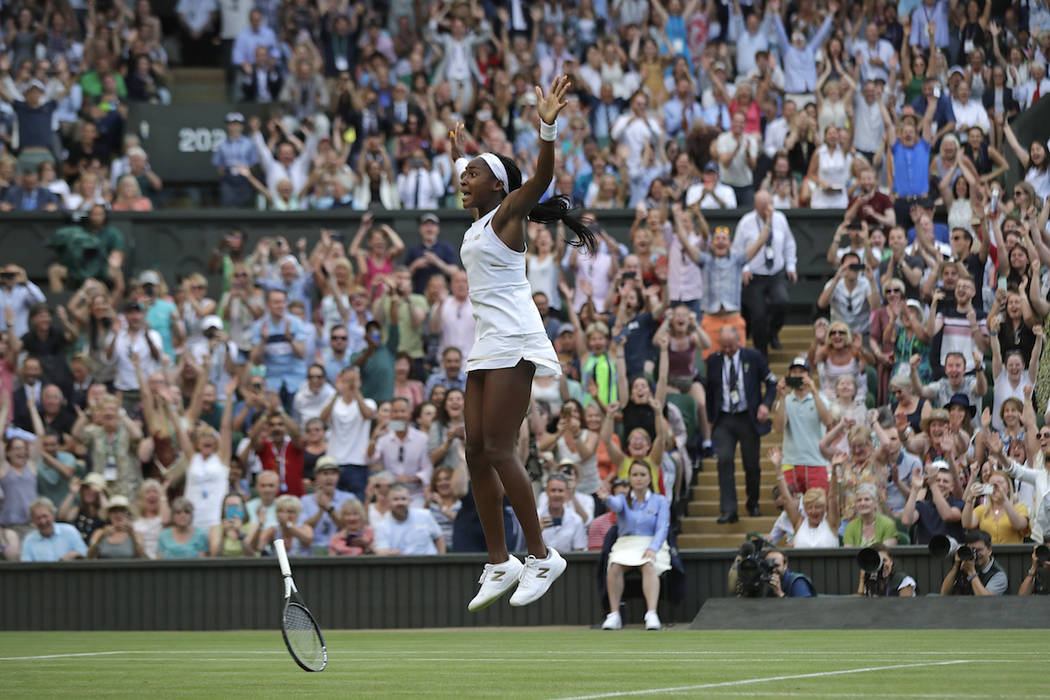 United States' Cori "Coco" Gauff celebrates after beating Slovenia's Polona Hercog in ...