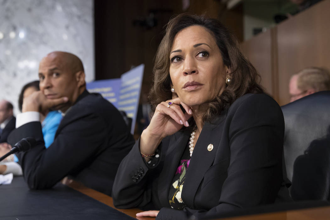 Sen. Kamala Harris, D-Calif., and Sen. Cory Booker, D-N.J., left. (AP Photo/J. Scott Applewhite)