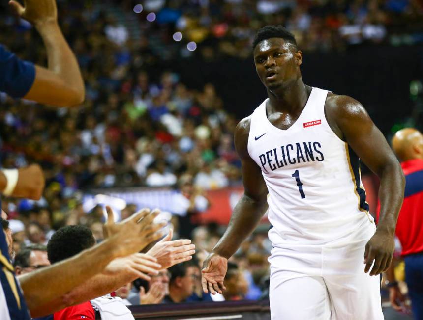 New Orleans Pelicans' Zion Williamson (1) returns to the bench as the team plays the New York K ...