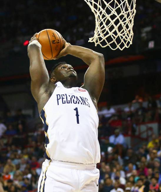 New Orleans Pelicans' Zion Williamson (1) goes to the basket to dunk against the New York Knick ...