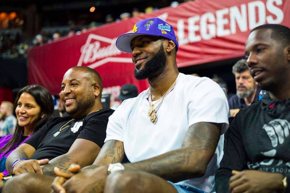 Los Angeles Lakers star LeBron James attends a basketball game between the Lakers and the Chica ...