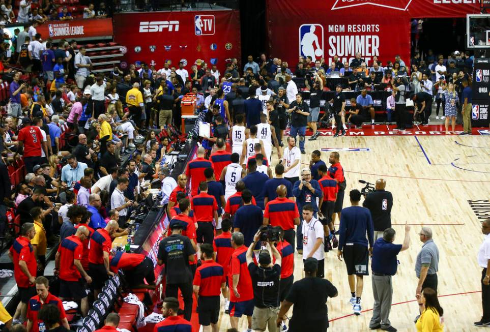 Members of the New York Knicks and the New Orleans Pelicans walk off the court after an earthqu ...