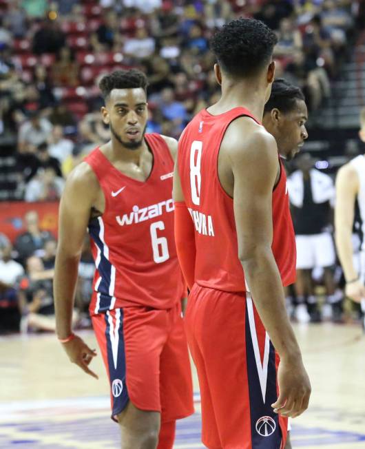 The Washington Wizards' forward Troy Brown Jr. (6) and forward Rui Hachimura (8) talk strategi ...