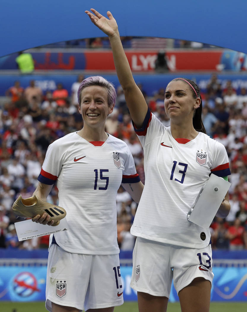 United States' Megan Rapinoe, left, and her teammate Alex Morgan, right, after winning the Wome ...
