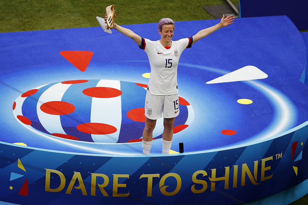 United States' Megan Rapinoe celebrates with the golden soccer shoe after her team won the Wome ...