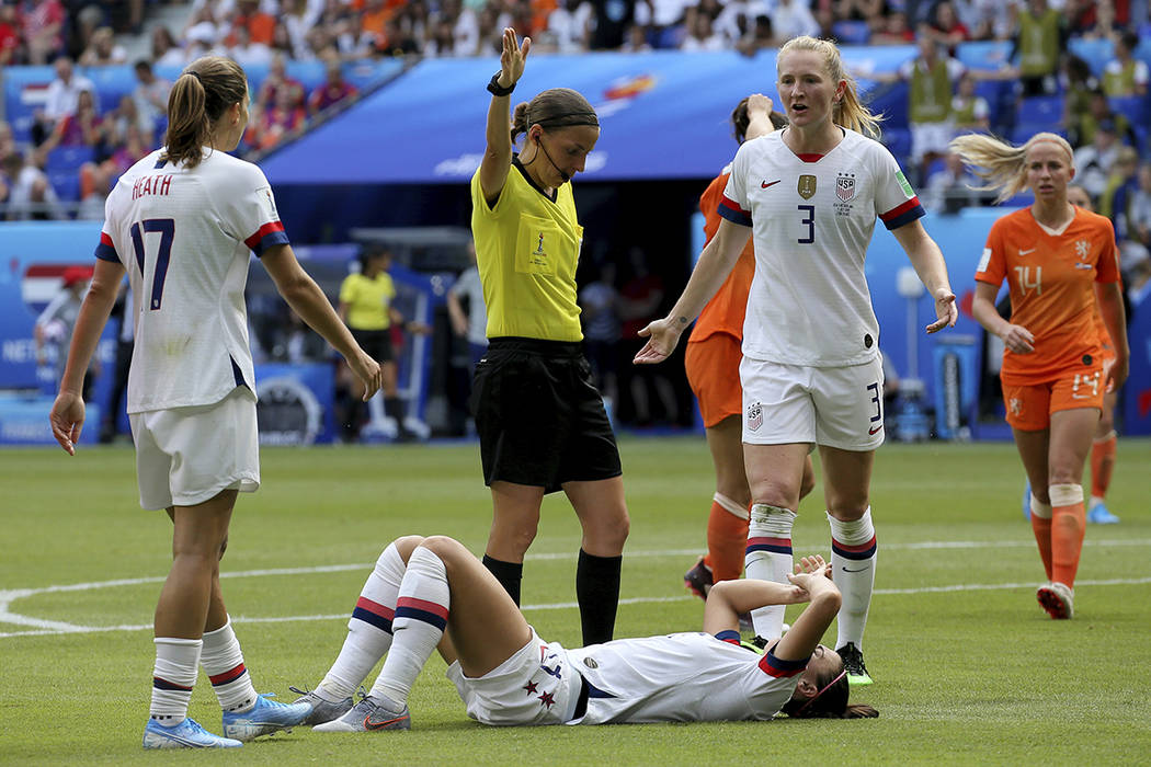 United States' Alex Morgan lays on the ground after she was faulted during the Women's World Cu ...