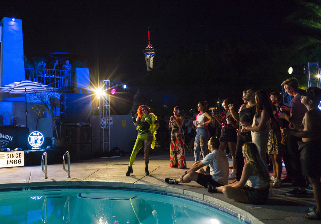 Attendees watch a drag show competition during the Jack Daniel's House No. 7, a pop-up experien ...