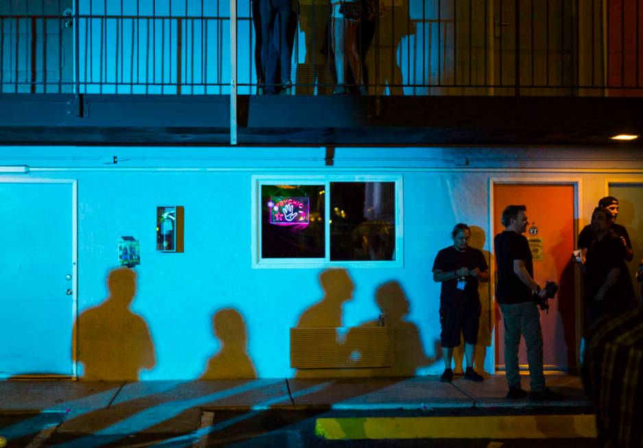 Attendees stand outside of the psychic room during the Jack Daniel's House No. 7, a pop-up expe ...