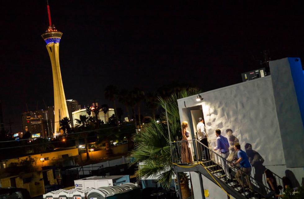 Attendees make their way to the White Rabbit speakeasy saloon during the Jack Daniel's House No ...