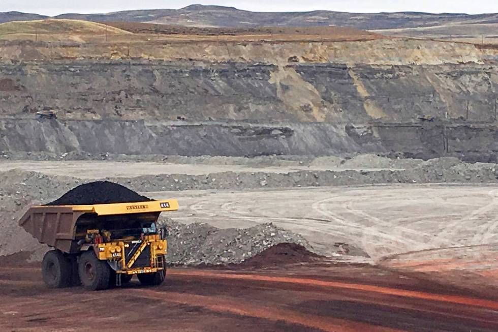 FILE - In this March 28, 2017, file photo, a dump truck hauls coal at Contura Energy's Eagle Bu ...