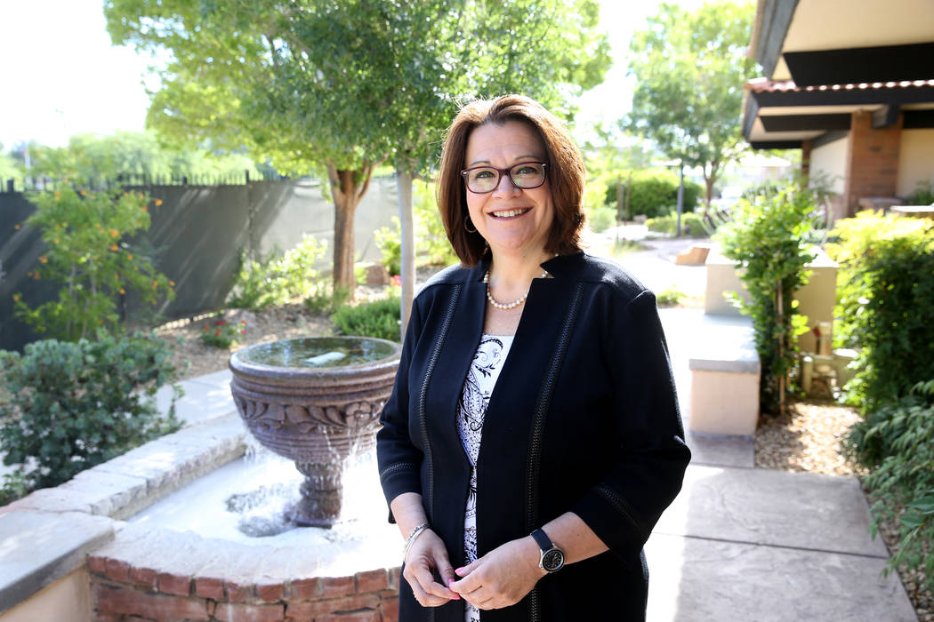 Nathan Adelson Hospice President and CEO Karen Rubel in the hospice's Healing Garden in Las Veg ...