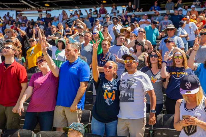 Aviators fans sing "take Me Out to the Ballpark" during a break in the game versus th ...