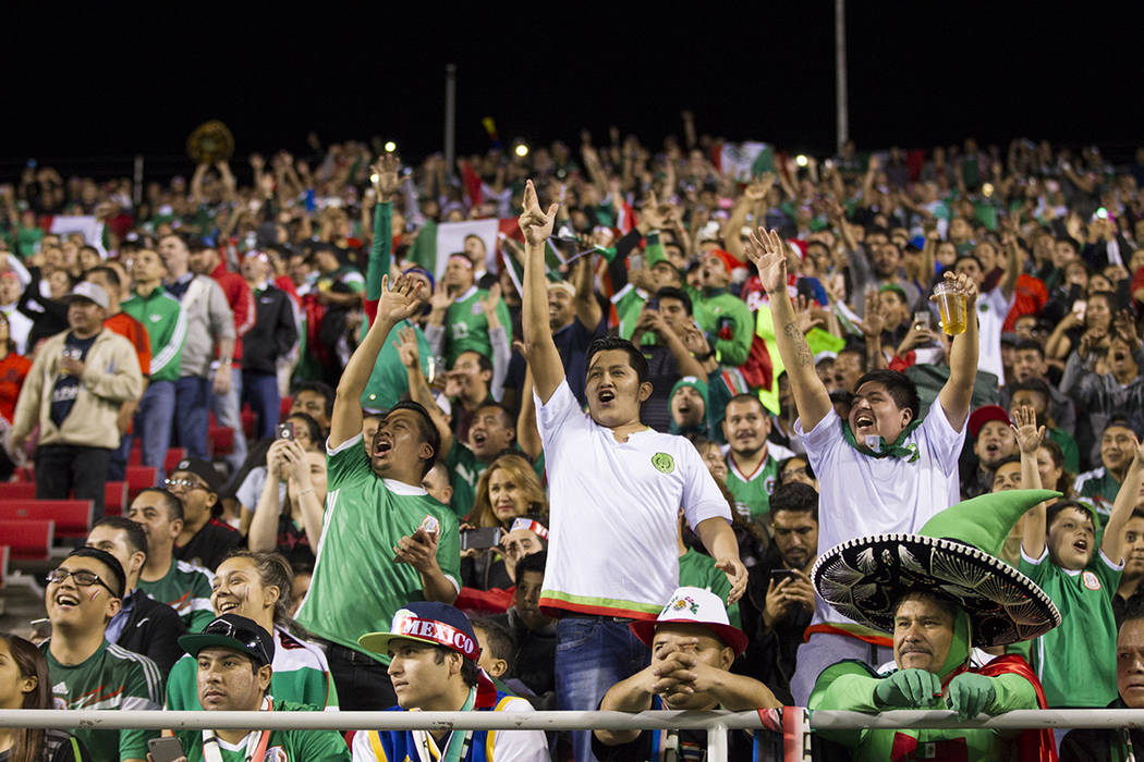 Fans cheer during the men's soccer exhibition match between Mexico and Iceland at Sam Boyd Stad ...