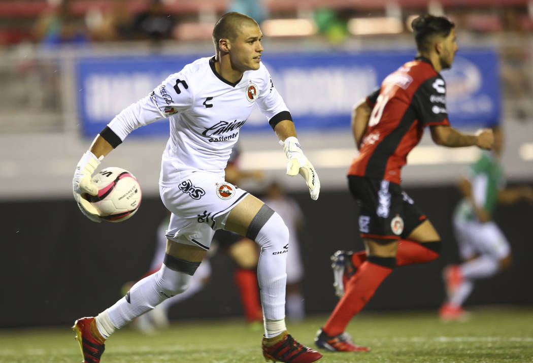 Tijuana's Gibran Lajud (25) passes the ball during an exhibition soccer match against Leon at S ...