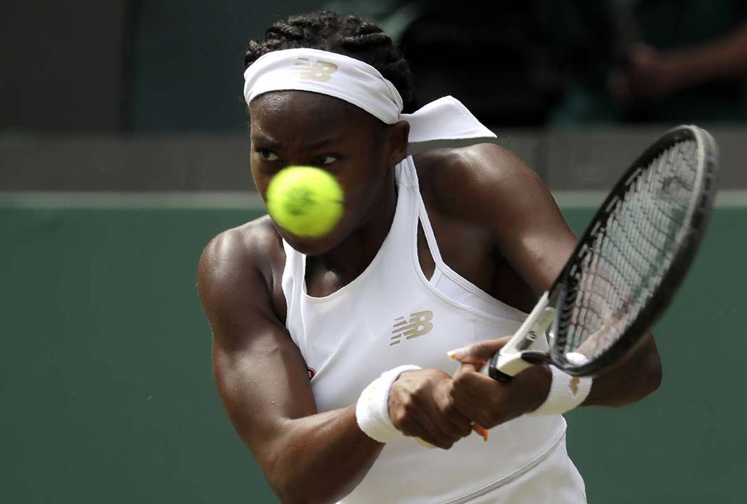 United States' Cori "Coco" Gauff returns the ball to Romania's Simona Halep in a wome ...