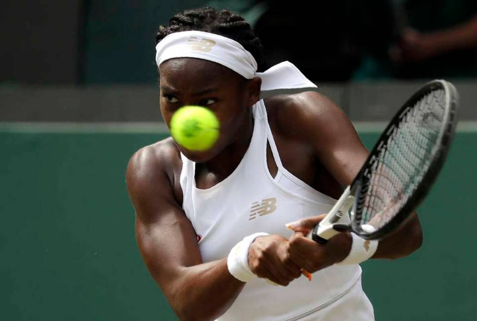 United States' Cori "Coco" Gauff returns the ball to Romania's Simona Halep in a wome ...