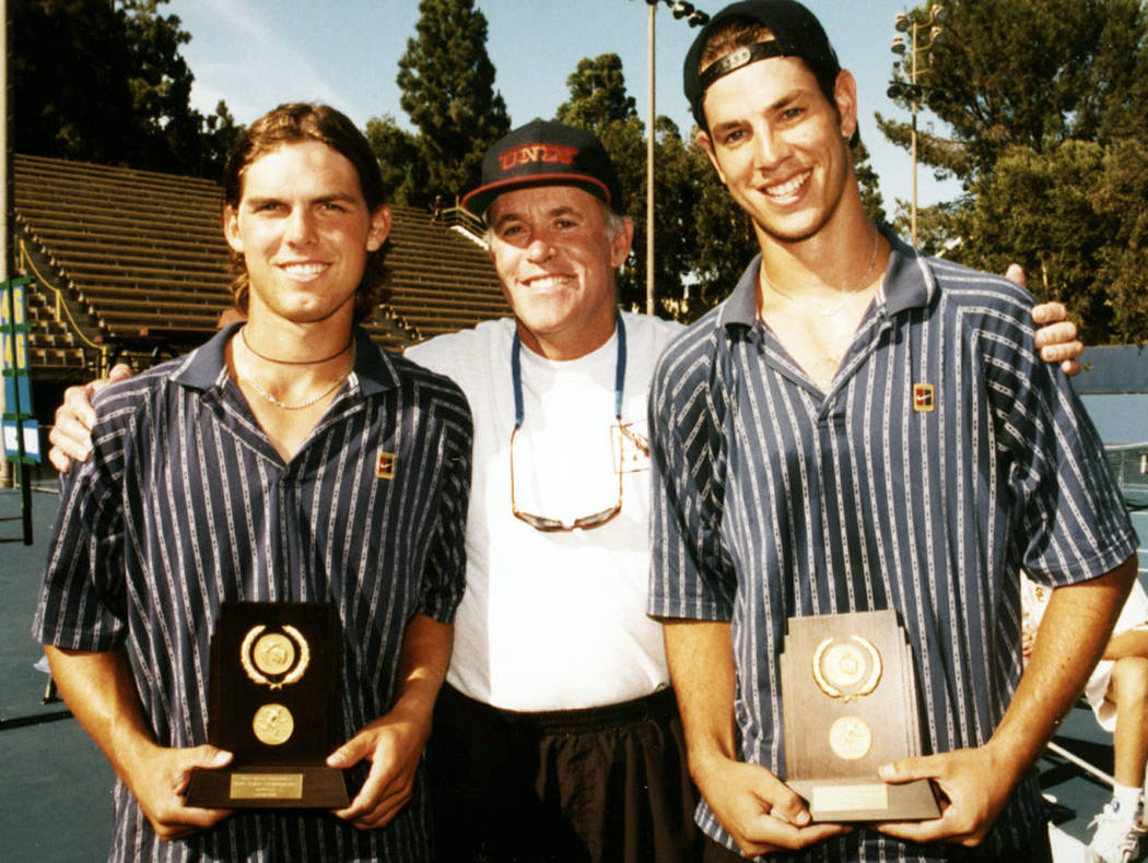 Luke Smith, left, poses with coach Larry Easley and doubles partner Tim Blenkiron at the NCAA t ...