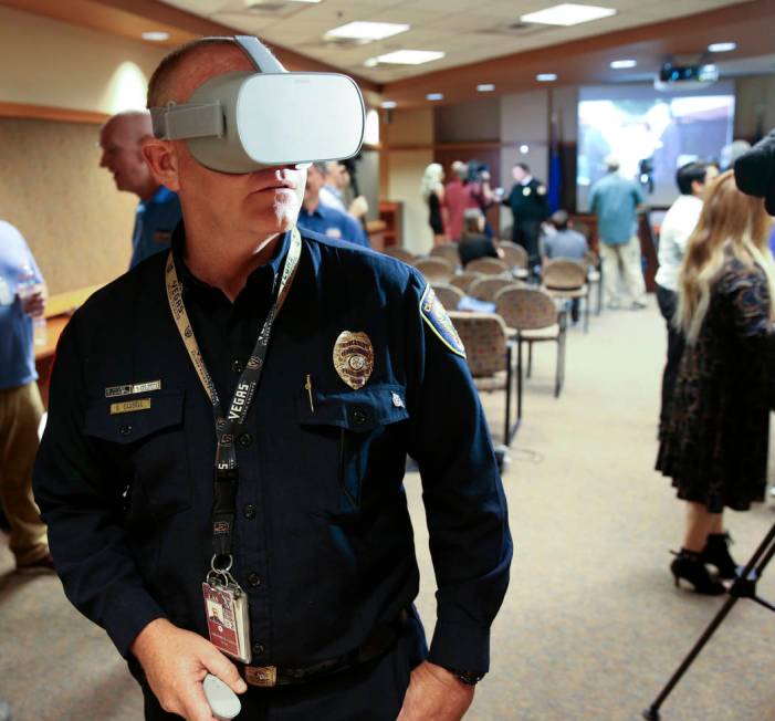 Clark County Fire Department Chief Greg Cassell checks out a Regional Flood Control District vi ...