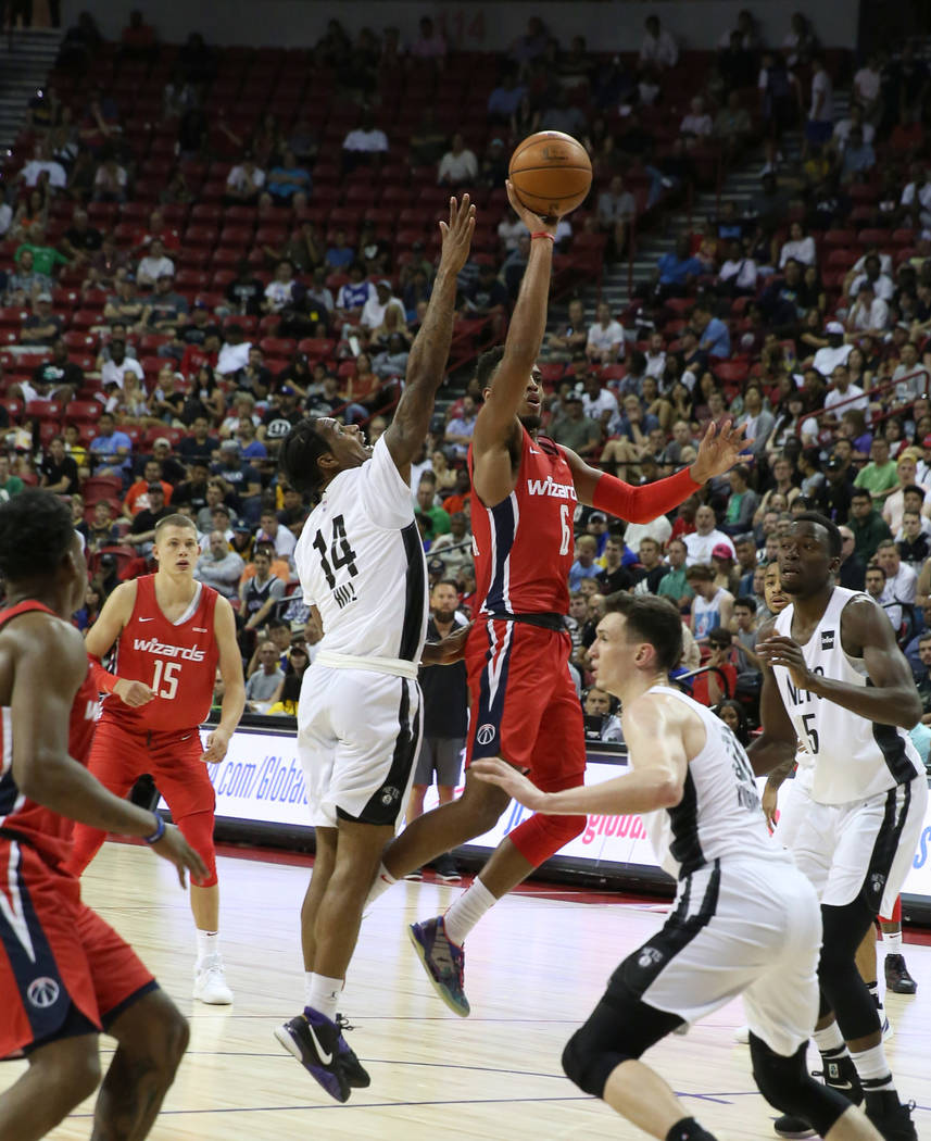 The Washington Wizards' forward Troy Brown Jr. (6) goes for the basket as the Brooklyn Nets' gu ...