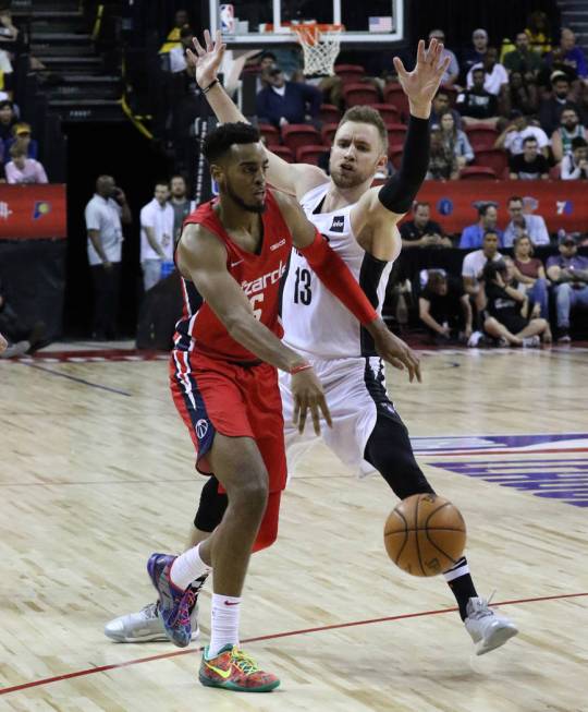 The Washington Wizards' forward Troy Brown Jr. (6) passes the ball as the Brooklyn Nets' forwar ...