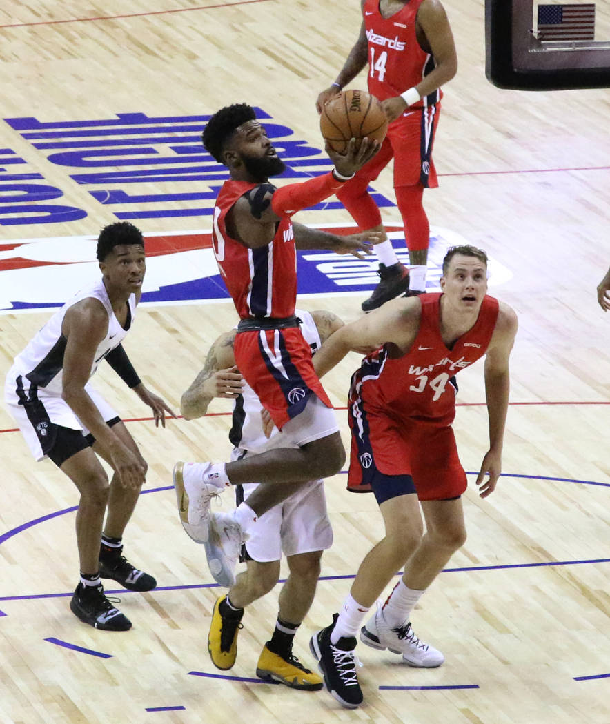 The Washington Wizards' guard Corey Davis (40) goes for the basket against the Brooklyn Nets' d ...