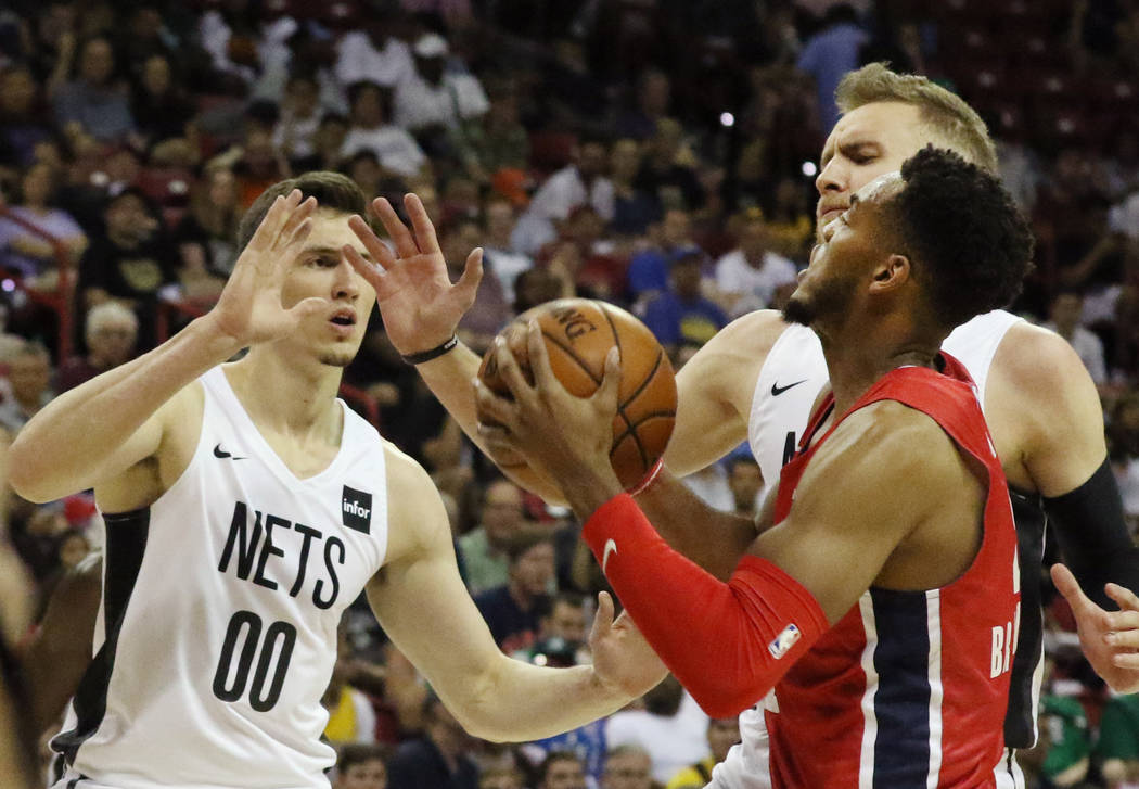 The Washington Wizards' forward Troy Brown Jr. (6) prepares to shoot to the basket as the Brook ...