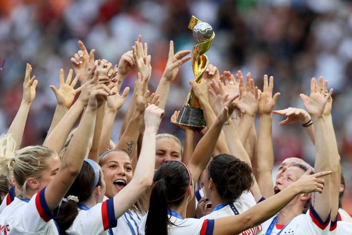 U.S. players celebrate their victory in the Women's World Cup final soccer match over the Nethe ...