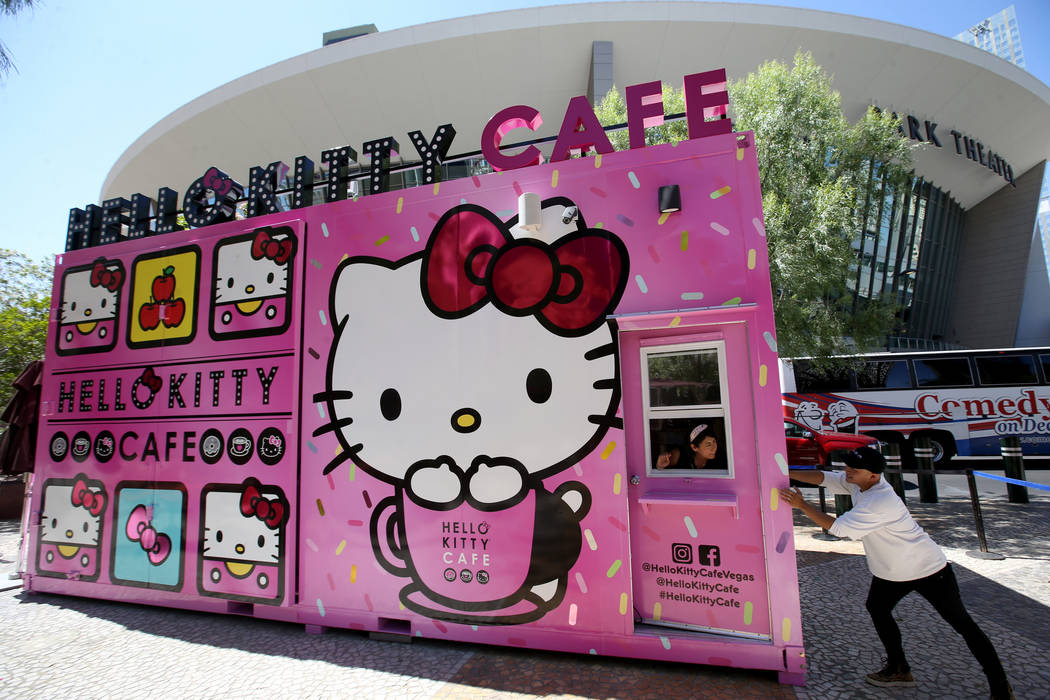 Hello Kitty Cafe owner Polo Nguyen, right, and Business Development Coordinator Melissa Paez pr ...