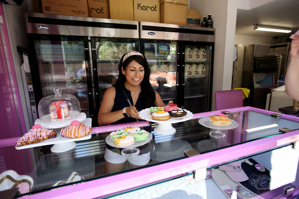 Hello Kitty Cafe Business Development Coordinator Melissa Paez prepares for a media preview for ...