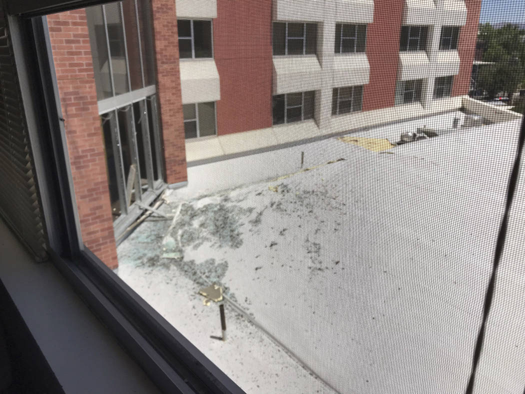 In this photo provided by Raven Green, is damage to a dormitory building with windows blown out ...