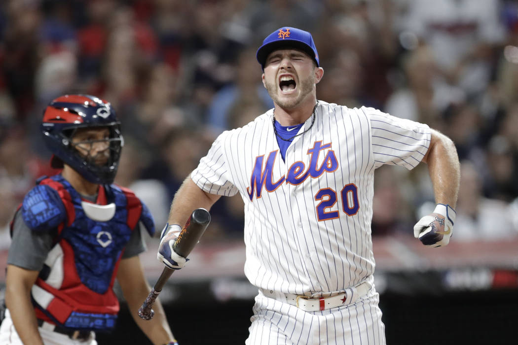 Pete Alonso, of the New York Mets, reacts during the Major League Baseball Home Run Derby, Mond ...