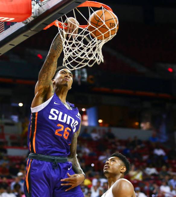 Phoenix Suns' Ray Spalding (26) dunks against the Memphis Grizzlies during the first half a bas ...