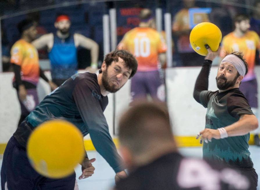 Rob Stiles, right, and Alex Weatbrook of team Misfits attack during a two-day, five-division do ...