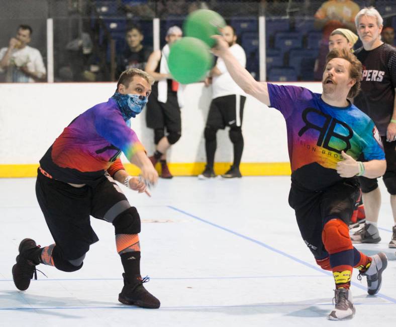 Reign Bros Brandon Cook, left, and Allyn Thomas attack during their match against the Heat at ...