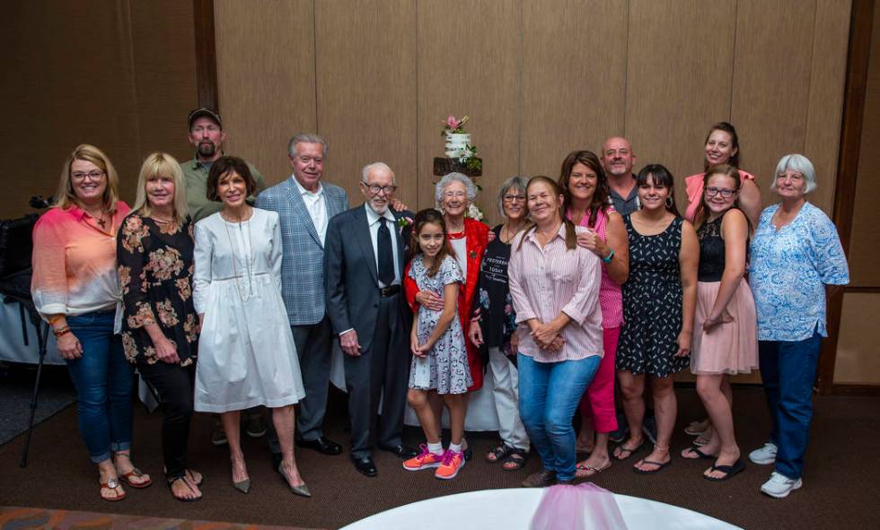 The family gathers for a group shot during a renewal of vows ceremony for Gail and Donna Andres ...