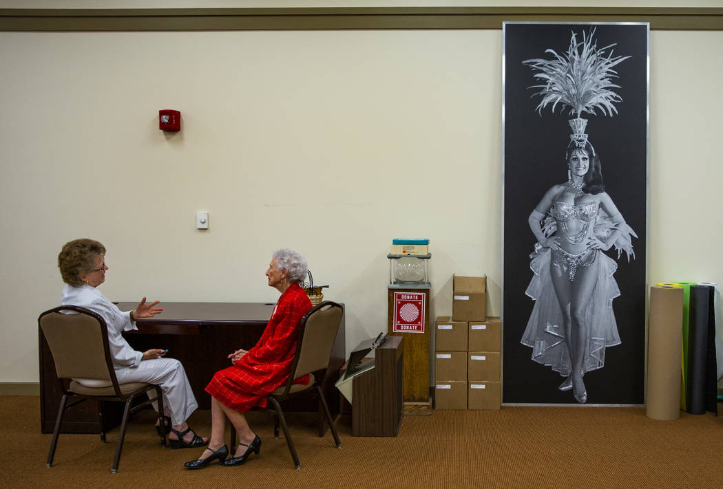 Longtime friends Judy Bundorf, left, and Donna Andress sneak away for a chat before Donna walks ...