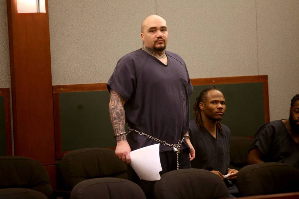 Christopher J. Weygant II, standing, during a court appearance at the Regional Justice Center i ...