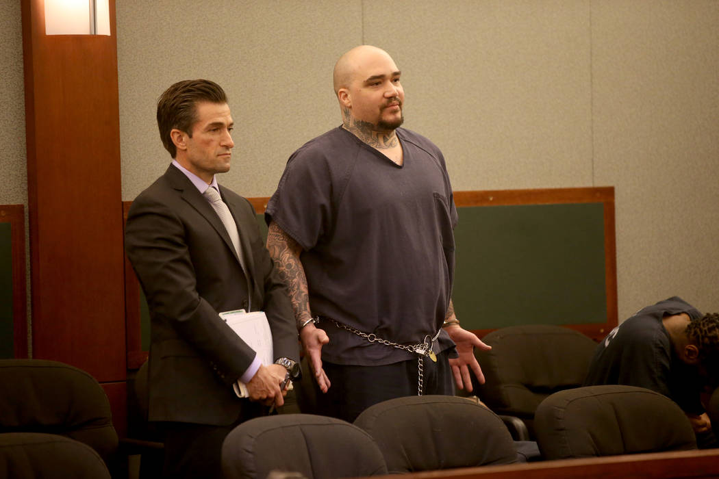 Christopher J. Weygant II, right, appears with his attorney Abel Yanez in court at the Regional ...